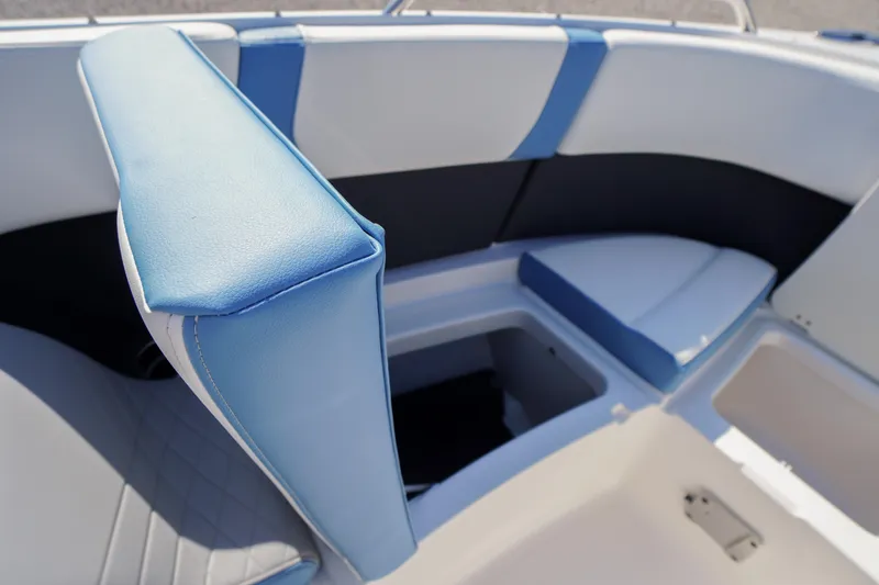Slide: The Image of Interior seating of 2026 Chaparral 270 OSX boat with blue and white upholstery. - 17