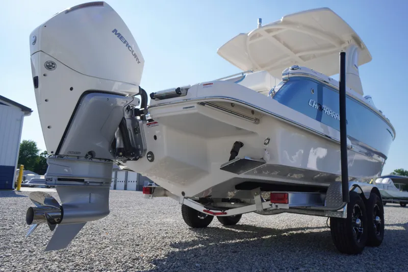 Slide: The Image of 2026 Chaparral 270 OSX boat with Mercury outboard engine on trailer. - 79
