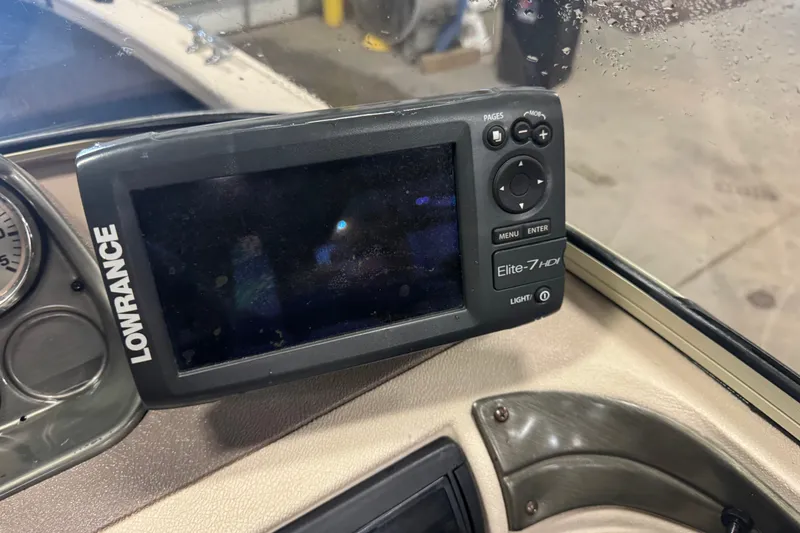 Slide: The Image of Lowrance Elite-7 HDI fishfinder on 2001 Crestliner 1700 boat dashboard. - 7