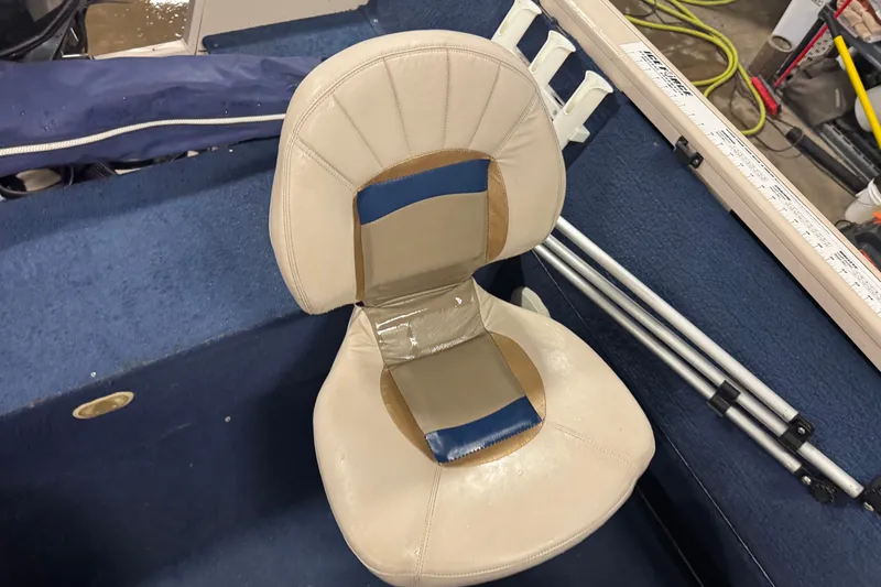 Slide: The Image of Crestliner 1700 boat seat, 2001 model, with blue and beige upholstery. - 12