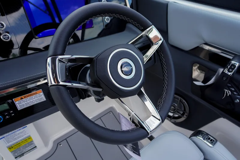 Slide: The Image of 2026 Chaparral SSX 4 steering wheel and dashboard, featuring modern design elements. - 30