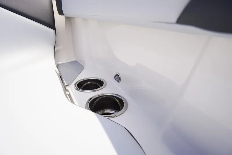 Slide: The Image of 2026 Chaparral SSX 4 boat interior with stainless steel cup holders. - 14