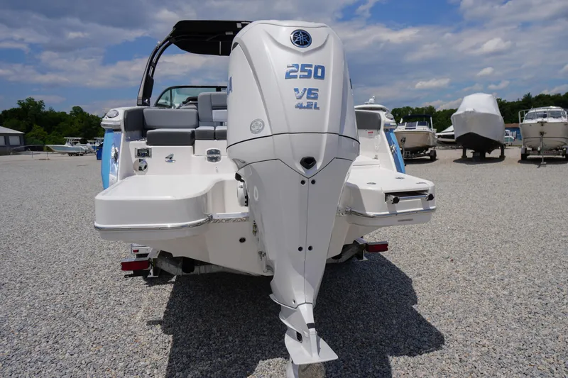 Slide: The Image of 2026 Chaparral SSX 4 boat with Yamaha 250 V6 engine in a marina setting. - 71