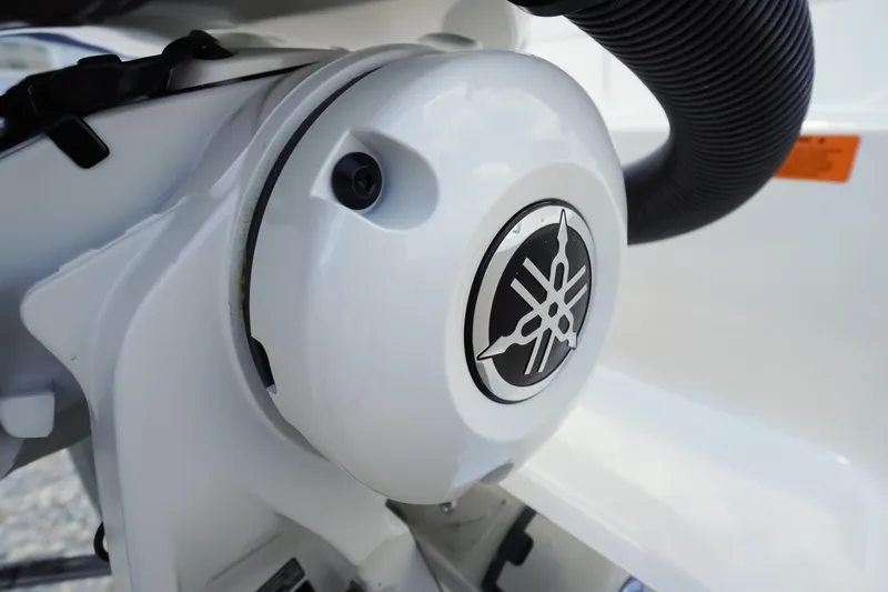 Slide: The Image of Close-up of a Yamaha engine component on a 2026 Chaparral SSX 4 boat. - 73