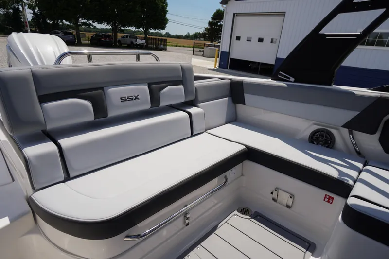 Slide: The Image of 2026 Chaparral SSX 4 boat interior with sleek gray seating and modern design. - 50