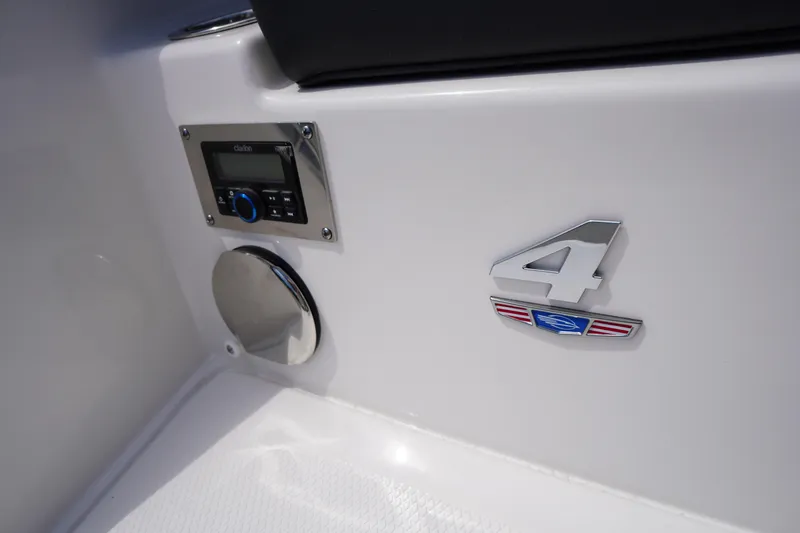 Slide: The Image of 2026 Chaparral SSX 4 interior detail with audio system and emblem. - 68
