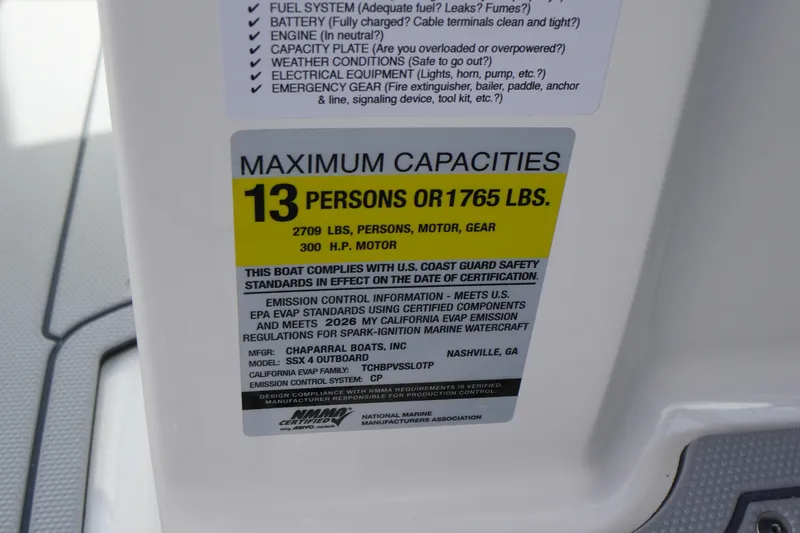 Slide: The Image of 2026 Chaparral SSX 4 capacity label: 13 persons, 1765 lbs, 300 HP motor. - 36
