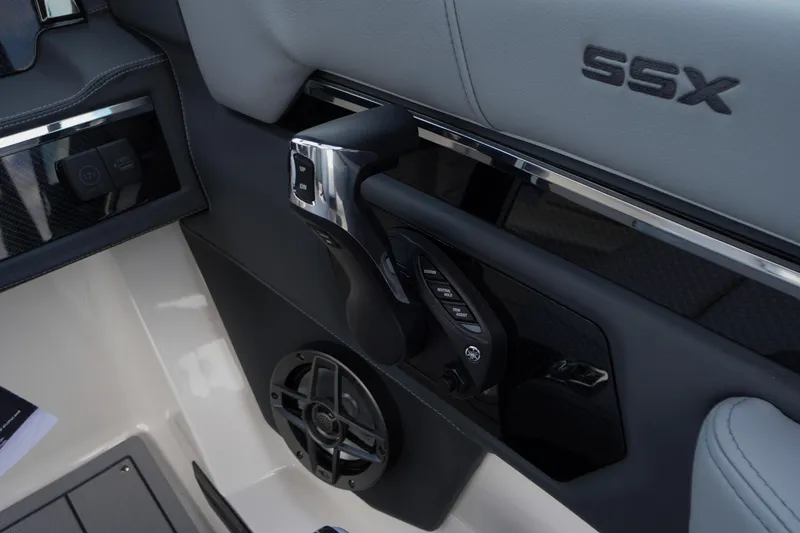 Slide: The Image of Interior view of 2026 Chaparral SSX 4 boat controls and speaker system. - 32