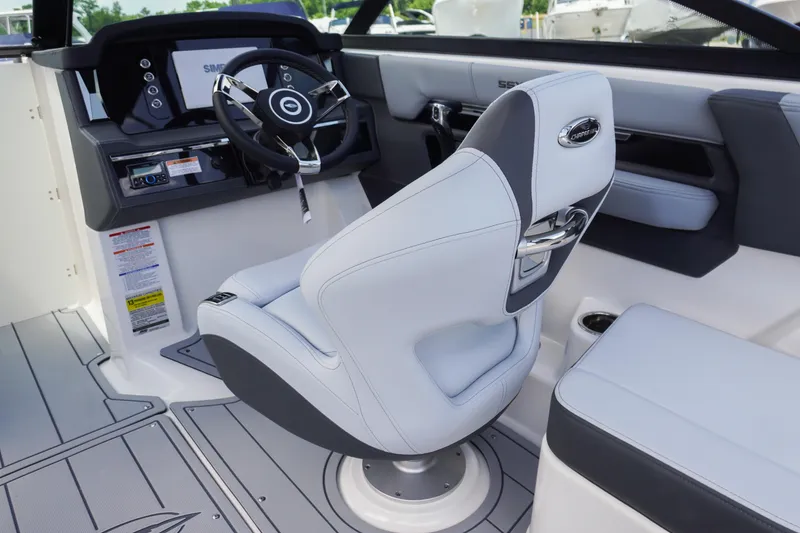 Slide: The Image of 2026 Chaparral SSX 4 boat interior with modern helm and seating. - 34