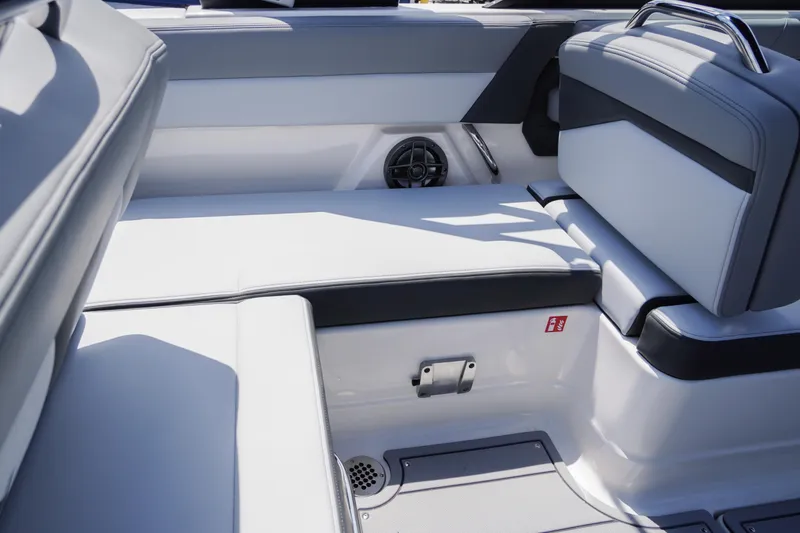 Slide: The Image of 2026 Chaparral SSX 4 boat interior with sleek seating and modern design. - 53