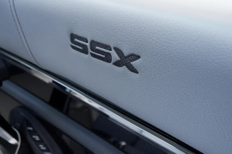 Slide: The Image of 2026 Chaparral SSX 4 interior detail with embossed logo on leather. - 33
