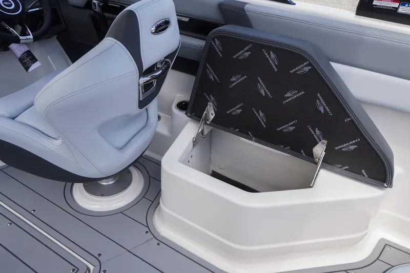 Slide: The Image of 2026 Chaparral SSX 4 boat interior with storage compartment and seating. - 65