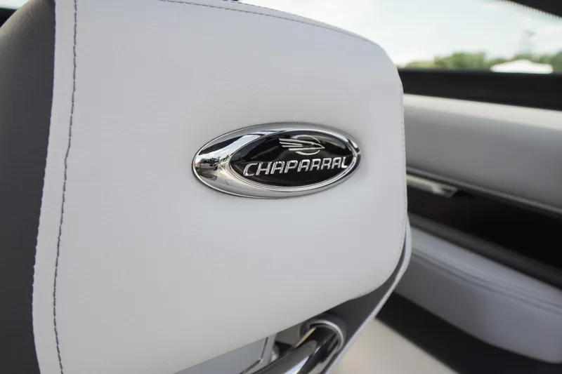 Slide: The Image of 2026 Chaparral SSX 4 interior with logo on white upholstery. - 35