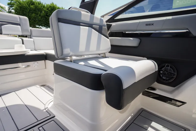 Slide: The Image of 2026 Chaparral SSX 4 boat interior with modern seating and sleek design. - 39
