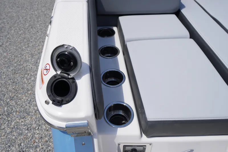 Slide: The Image of 2026 Chaparral SSX 4 boat interior with cup holders and seating. - 61