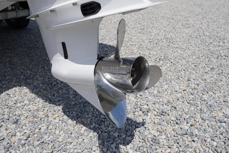 Slide: The Image of 2026 Chaparral SSX 4 boat propeller on gravel surface. - 70