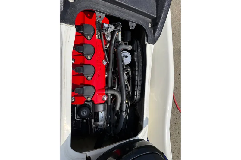 Slide: The Image of Engine view of a 2005 Honda Aquatrax F-12 with red components. - 8