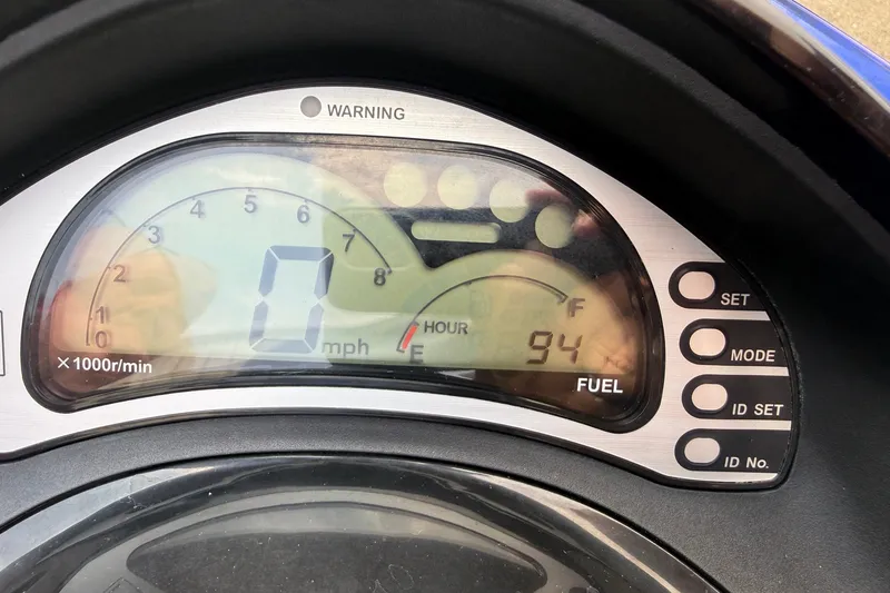 Slide: The Image of 2005 Honda Aquatrax F-12 dashboard displaying 0 mph and 94 hours. - 7
