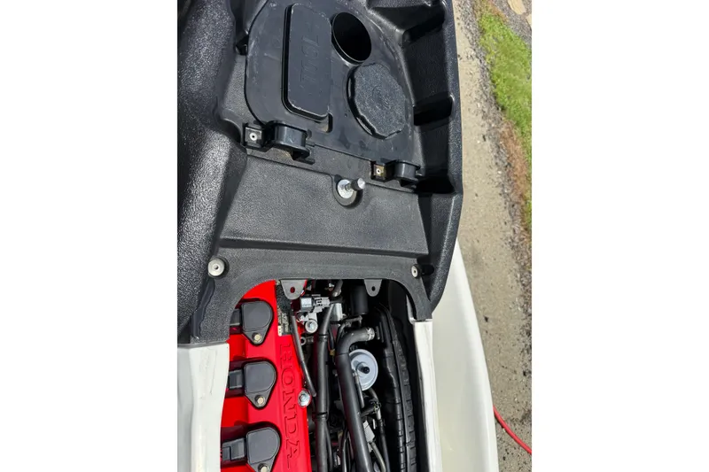 Slide: The Image of 2005 Honda Aquatrax F-12 engine compartment, showcasing internal components and design. - 9