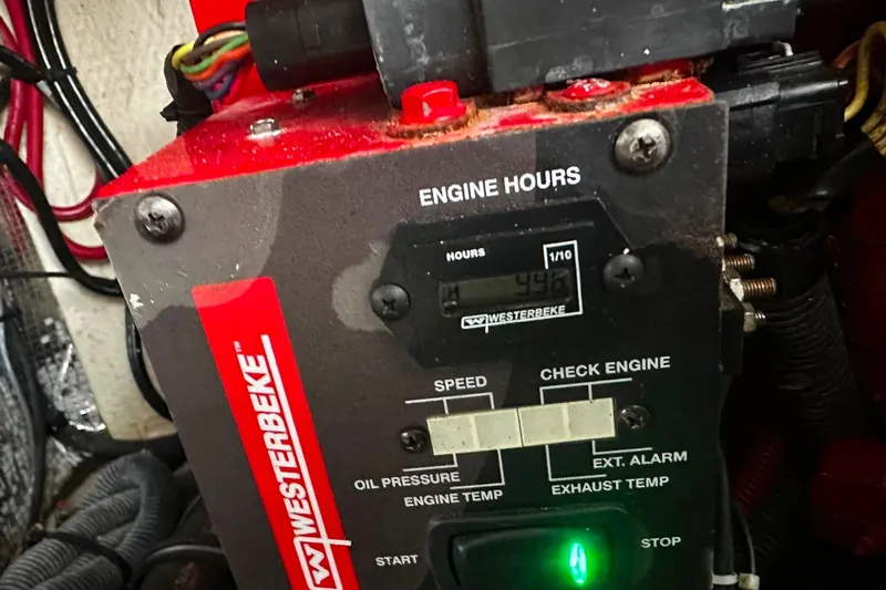 Slide: The Image of Westerbeke engine hour meter displaying 946 hours on a 2021 Regal 28 Express. - 21