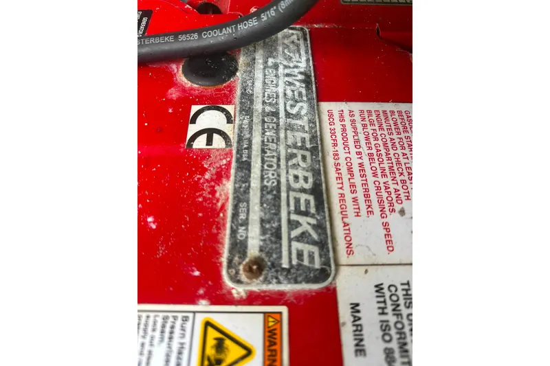 Slide: The Image of Close-up of a Westerbeke generator label on a 2021 Regal 28 Express boat. - 10