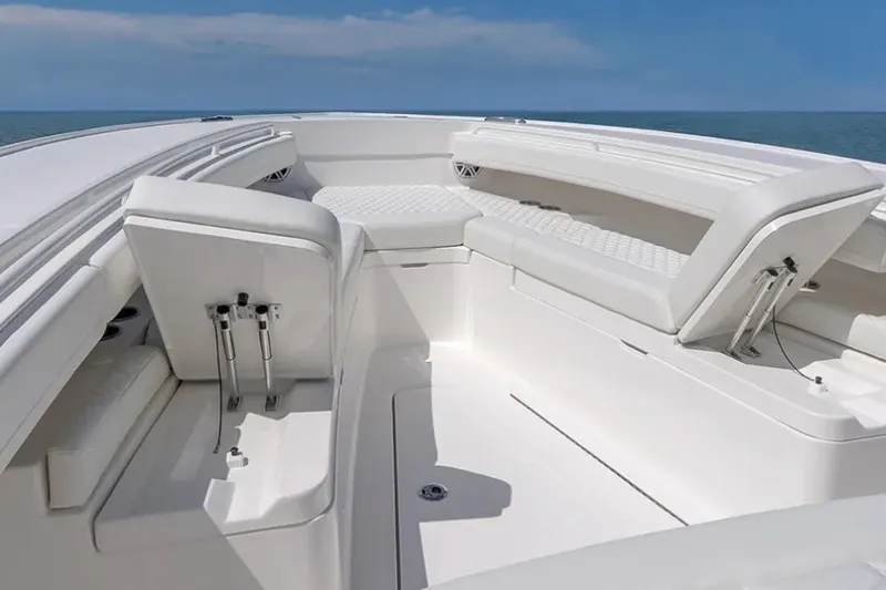 Slide: The Image of 2027 Regulator 31 boat interior with white seating and ocean view. - 5