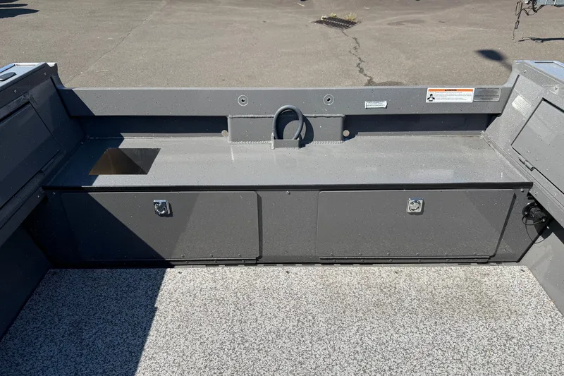 Slide: The Image of 2026 Alumaweld Free Drifter 20 boat interior with storage compartments and non-slip flooring. - 29
