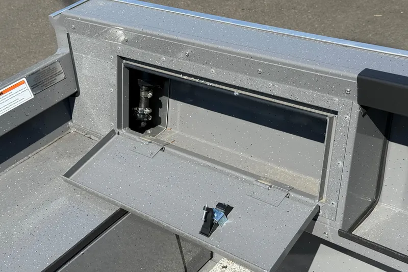 Slide: The Image of 2026 Alumaweld Free Drifter 20 boat compartment with open hatch, showcasing interior details. - 26