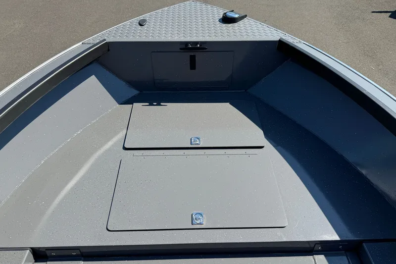 Slide: The Image of 2026 Alumaweld Free Drifter 20 boat interior with storage compartments and non-slip flooring. - 21