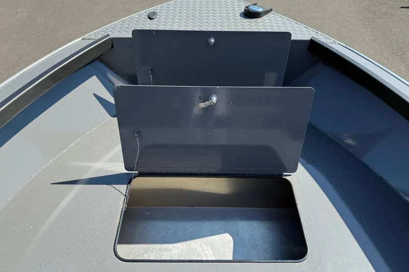 Slide: The Image of 2026 Alumaweld Free Drifter 20 boat storage compartment with open hatch. - 19