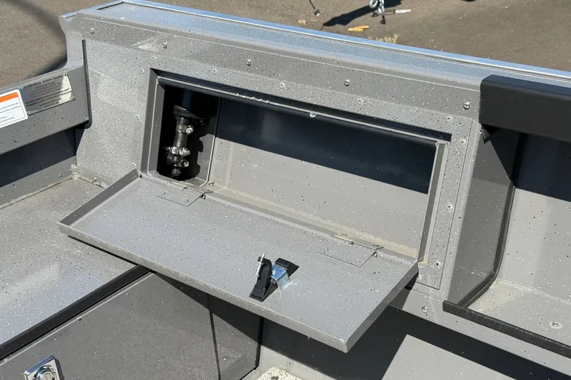 Slide: The Image of 2026 Alumaweld Free Drifter 20 boat compartment with open storage hatch. - 8