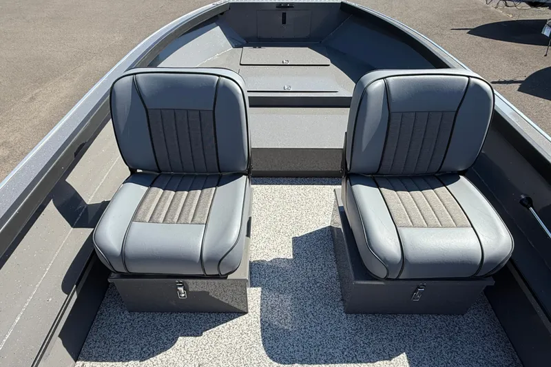 Slide: The Image of 2026 Alumaweld Free Drifter 20 boat interior with two gray seats. - 11