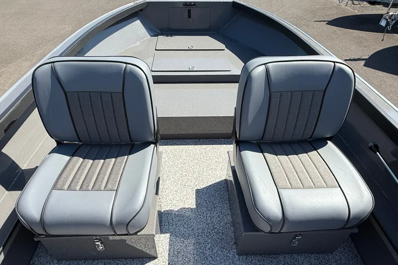 Slide: The Image of 2026 Alumaweld Free Drifter 20 boat interior with two gray cushioned seats. - 15