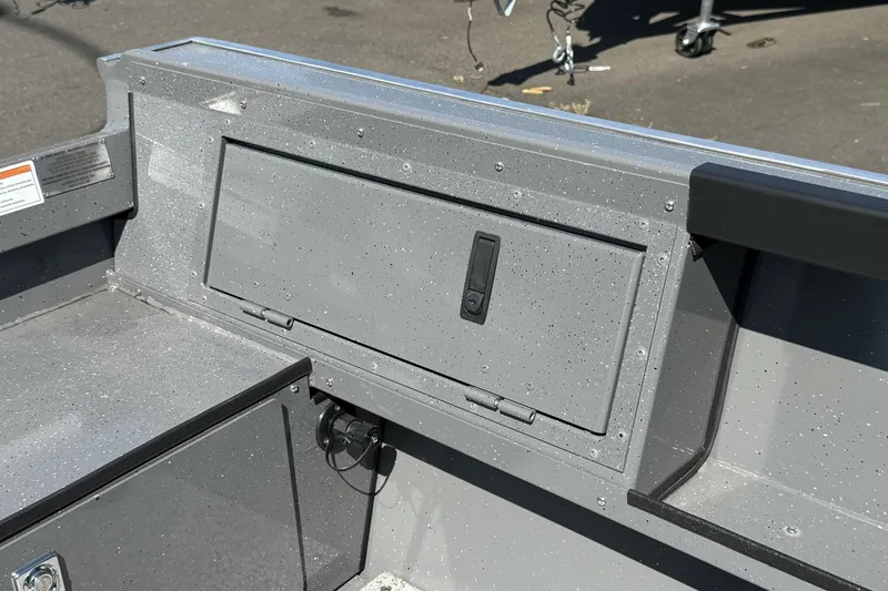 Slide: The Image of 2026 Alumaweld Free Drifter 20 boat interior with storage compartment, gray finish. - 9