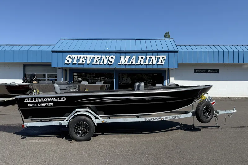 The Image of 2026 Alumaweld Free Drifter 20 boat on trailer at Stevens Marine dealership. - 1