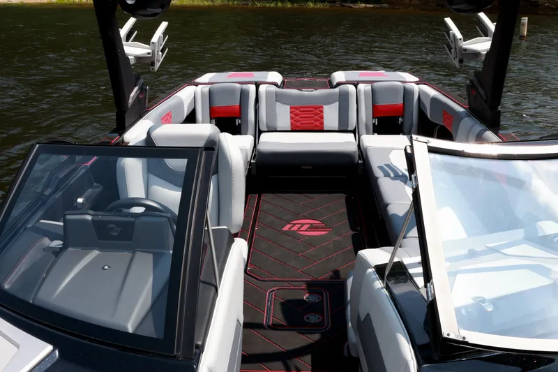 Slide: The Image of 2023 Malibu Wakesetter 25 LSV interior with luxurious seating and sleek design on the water. - 15