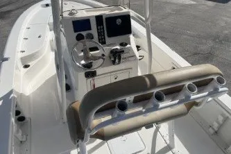 Slide: The Image of 2023 NauticStar 227 XTS boat interior with steering console and seating. - 8