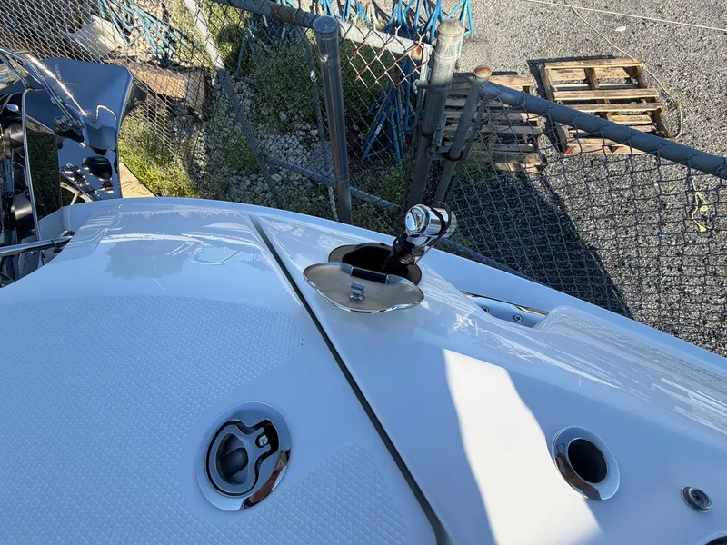 Slide: The Image of Close-up of a Sea Ray SLX 280 Outboard deck with stainless steel fittings. - 41