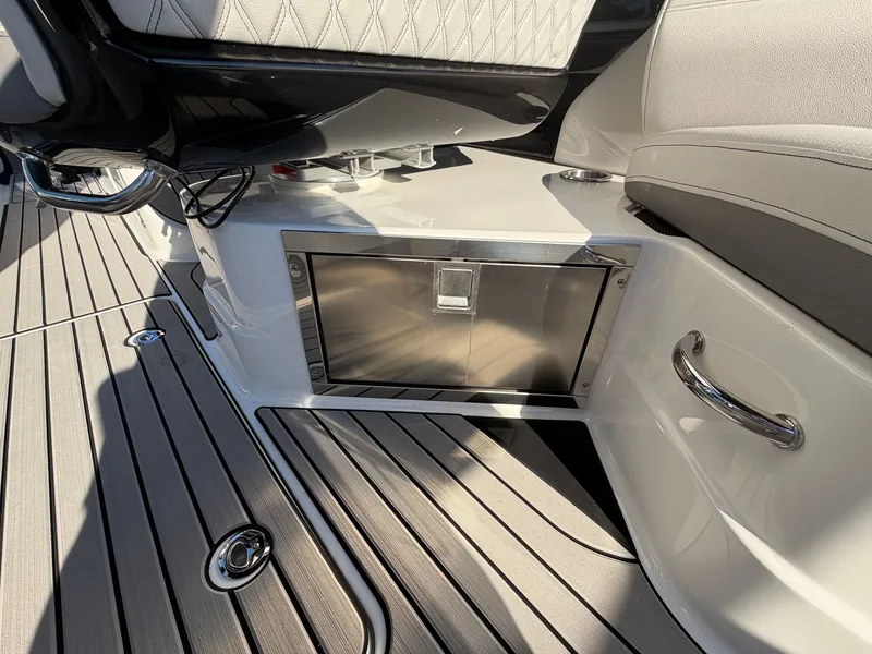 Slide: The Image of Close-up of the 2027 Sea Ray SLX 280 Outboard featuring sleek seating and storage. - 18
