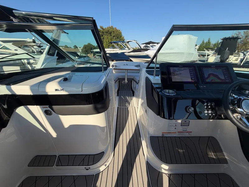 Slide: The Image of 2027 Sea Ray SLX 280 Outboard with a modern cockpit and sleek seating. - 24