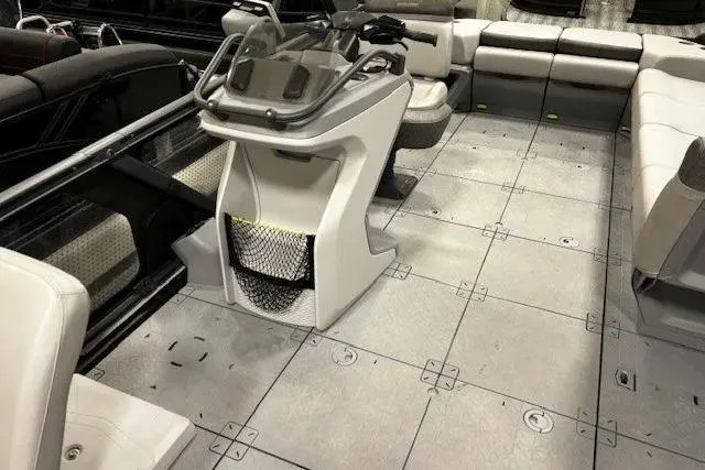 Slide: The Image of 2022 Sea-Doo Switch Cruise 21 interior with spacious seating and modern helm design. - 7