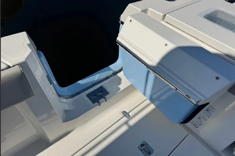 Slide: The Image of 2023 Pursuit S 378 Sport boat interior with seating and storage compartments. - 16