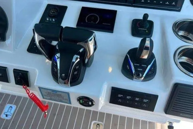 Slide: The Image of Control panel of 2023 Pursuit S 378 Sport boat with advanced navigation features. - 16