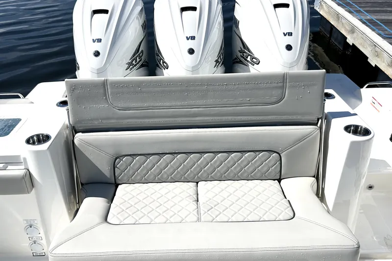 Slide: The Image of 2023 Pursuit S 378 Sport boat with triple V8 engines and luxurious seating. - 15
