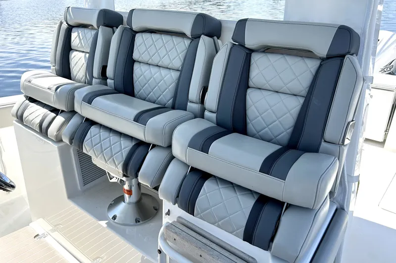 Slide: The Image of Luxurious seating on 2023 Pursuit S 378 Sport boat with quilted upholstery. - 13