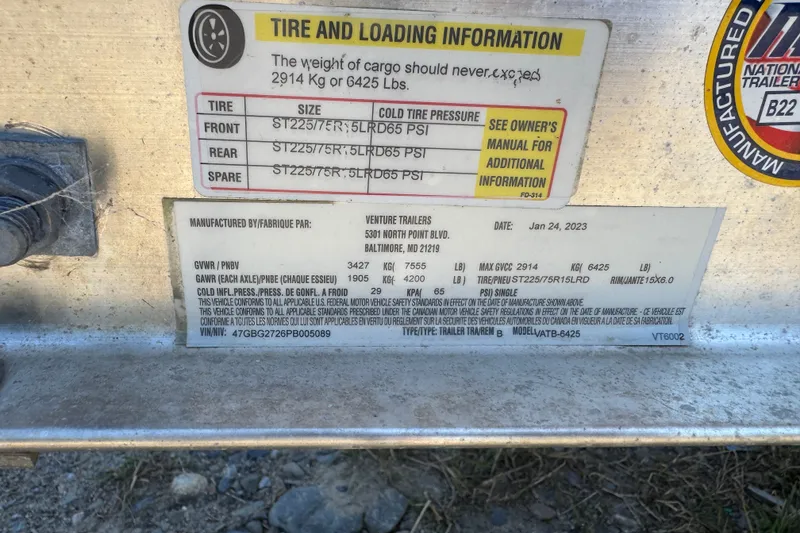 Slide: The Image of Tire and loading information label on a 2023 Key West 239 DFS trailer. - 14