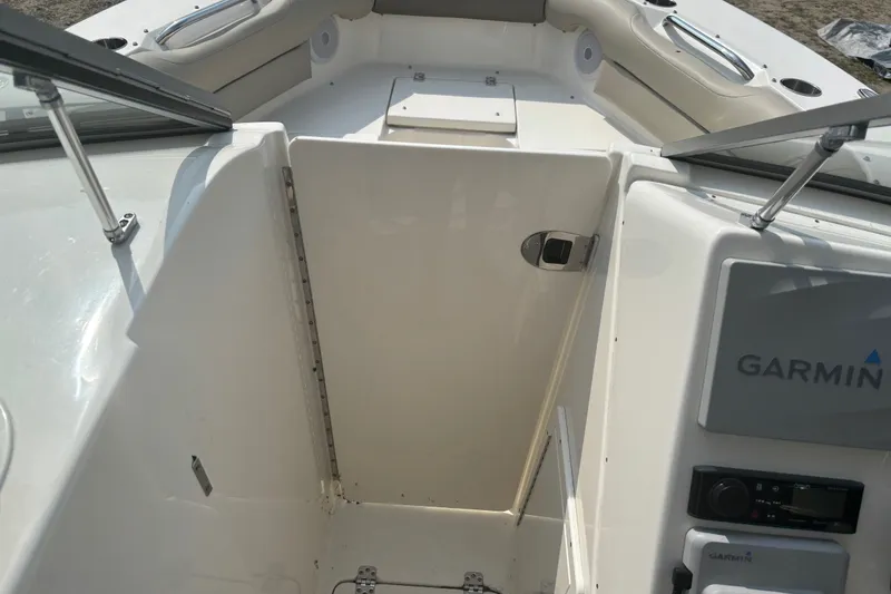 Slide: The Image of 2023 Key West 239 DFS boat interior with Garmin navigation system. - 49