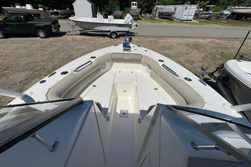 Slide: The Image of 2023 Key West 239 DFS boat interior with spacious seating and modern design. - 9