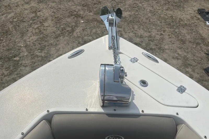 Slide: The Image of 2023 Key West 239 DFS boat bow with anchor and chain mechanism. - 39