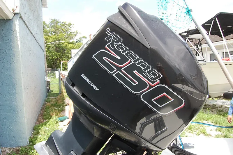Slide: The Image of Mercury Racing 250 outboard motor on a 1992 Mako 221 Center Console boat. - 6